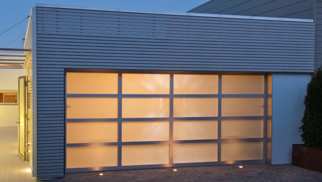Custom aluminum glass garage door from Precise Iron Doors