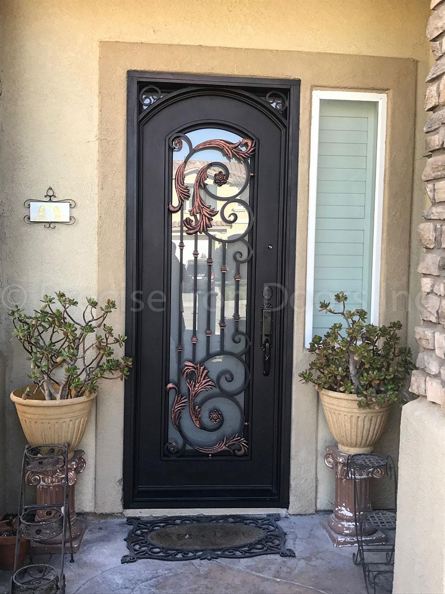 London wrought iron front entrance door with scrollwork