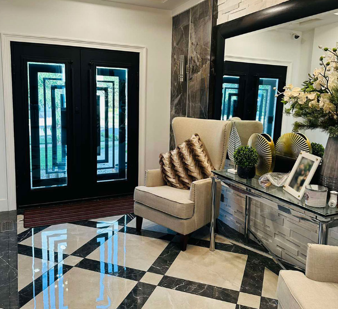 Custom iron door design in a beautiful luxury home