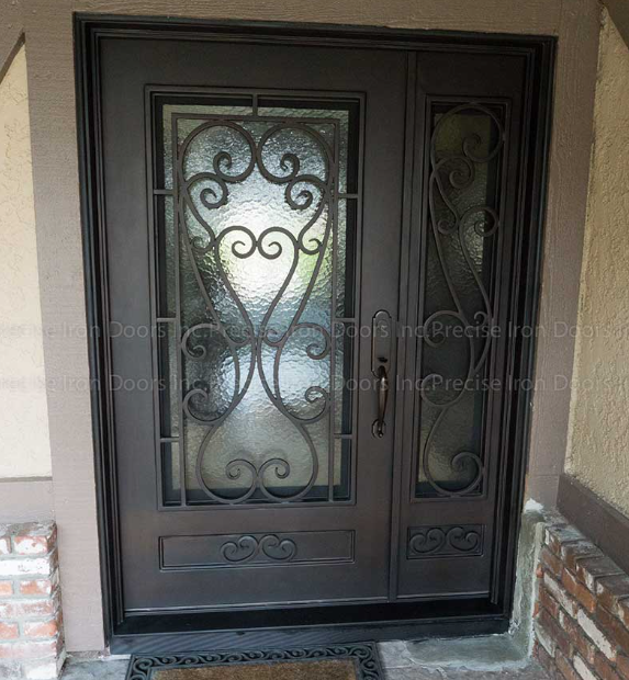 Iron door with textured glass form Precise Iron Doors